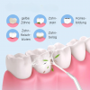 Illustration der SmileStream AquaPulse Munddusche in Aktion, die Zahnbelag entfernt und Zahnfleischbluten, Zahnstein sowie Kariesbildung vorbeugt.